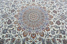 Central medallion detail of 2000s Kashan rug from Iran / Persia