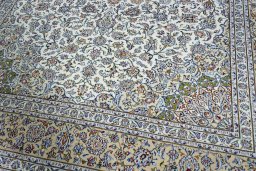 Close-up detail of 2000s Kashan rug from Iran / Persia showing Wool weave