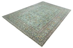Corner detail of 2000s Kashan rug showing border pattern and Wool pile