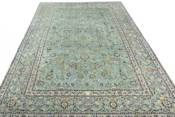 Surface texture of 2000s Kashan rug with natural Wool and intricate pattern
