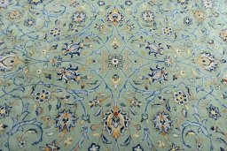 Central medallion detail of 2000s Kashan rug from Iran / Persia