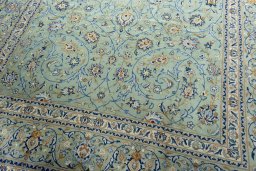 Close-up detail of 2000s Kashan rug from Iran / Persia showing Wool weave