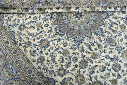 Close-up detail of 2000s Kashan rug from Iran / Persia showing Cork weave