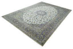 Corner detail of 2000s Kashan rug showing border pattern and Cork pile