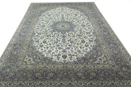 Surface texture of 2000s Kashan rug with natural Cork and intricate pattern
