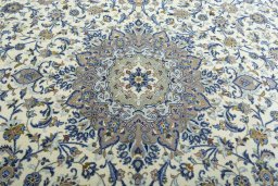 Central medallion detail of 2000s Kashan rug from Iran / Persia