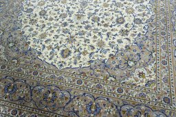 Close-up detail of 2000s Kashan rug from Iran / Persia showing Cork weave