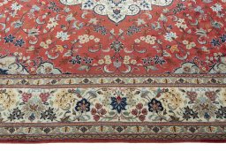 Corner detail of New Kashan rug showing border pattern and Wool pile