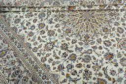 Close-up detail of 2000s Kashan rug from Iran / Persia showing Wool weave