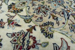 Central medallion detail of 2000s Kashan rug from Iran / Persia