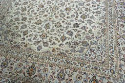 Close-up detail of 2000s Kashan rug from Iran / Persia showing Wool weave