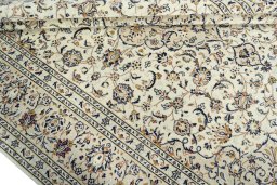 Close-up detail of 2000s Kashan rug from Iran / Persia showing Wool weave