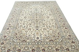 Surface texture of 2000s Kashan rug with natural Wool and intricate pattern