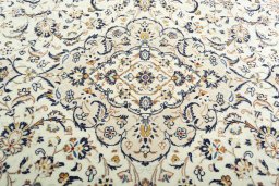 Central medallion detail of 2000s Kashan rug from Iran / Persia