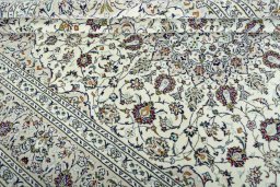 Close-up detail of 2000s Kashan rug from Iran / Persia showing Wool weave