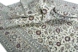 Surface texture of 2000s Kashan rug with natural Wool and intricate pattern