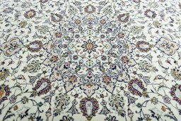 Central medallion detail of 2000s Kashan rug from Iran / Persia