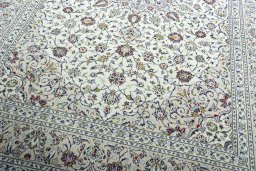 Close-up detail of 2000s Kashan rug from Iran / Persia showing Wool weave
