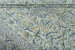 Close-up detail of 2000s Kashan rug from Iran / Persia showing Wool weave