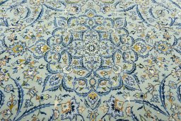 Central medallion detail of 2000s Kashan rug from Iran / Persia