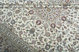 Close-up detail of 2000s Kashan rug from Iran / Persia showing Wool weave