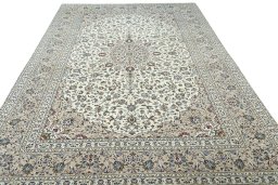 Surface texture of 2000s Kashan rug with natural Wool and intricate pattern