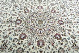 Central medallion detail of 2000s Kashan rug from Iran / Persia