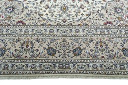 Full view of 2000s Kashan rug from Iran / Persia, 426 × 292 cm in Beige tones