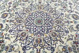 Central medallion detail of 2000s Kashan rug from Iran / Persia
