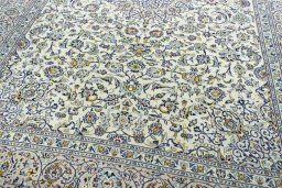 Close-up detail of 2000s Kashan rug from Iran / Persia showing Wool weave