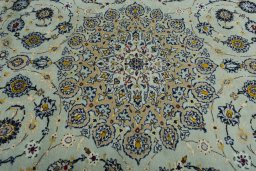 Central medallion detail of 2000s Kashan rug from Iran / Persia