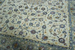 Close-up detail of 2000s Kashan rug from Iran / Persia showing Wool weave