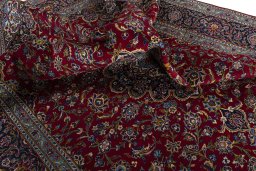 Surface texture of 2000s Kashan rug with natural Wool and intricate pattern