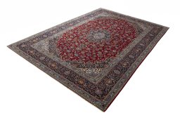 Corner detail of 2000s Kashan rug showing border pattern and Wool pile