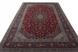 Surface texture of 2000s Kashan rug with natural Wool and intricate pattern