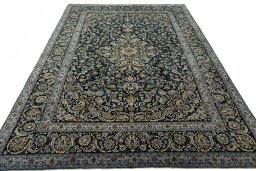 Surface texture of 2000s Kashan rug with natural Wool and intricate pattern