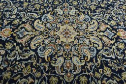Central medallion detail of 2000s Kashan rug from Iran / Persia