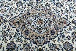Central medallion detail of 2000s Kashan rug from Iran / Persia
