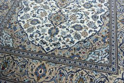 Close-up detail of 2000s Kashan rug from Iran / Persia showing Wool weave