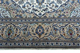 Full view of 2000s Kashan rug from Iran / Persia, 298 × 200 cm in Beige tones