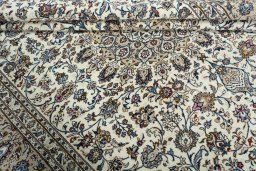 Close-up detail of 2000s Kashan rug from Iran / Persia showing Wool weave