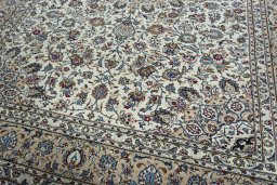 Close-up detail of 2000s Kashan rug from Iran / Persia showing Wool weave