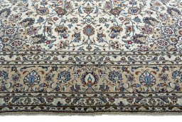 Full view of 2000s Kashan rug from Iran / Persia, 417 × 300 cm in Beige tones