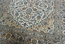 Close-up detail of 2000s Kashan rug from Iran / Persia showing Wool weave