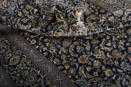 Surface texture of 2000s Kashan rug with natural Wool and intricate pattern