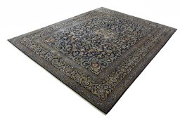 Corner detail of 2000s Kashan rug showing border pattern and Wool pile