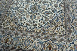 Close-up detail of 2000s Kashan rug from Iran / Persia showing Wool weave
