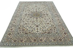 Surface texture of 2000s Kashan rug with natural Wool and intricate pattern