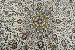 Central medallion detail of 2000s Kashan rug from Iran / Persia