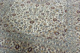 Close-up detail of 2000s Kashan rug from Iran / Persia showing Wool weave